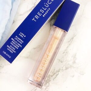Tresluce beauty plumping lip gloss in dazzling